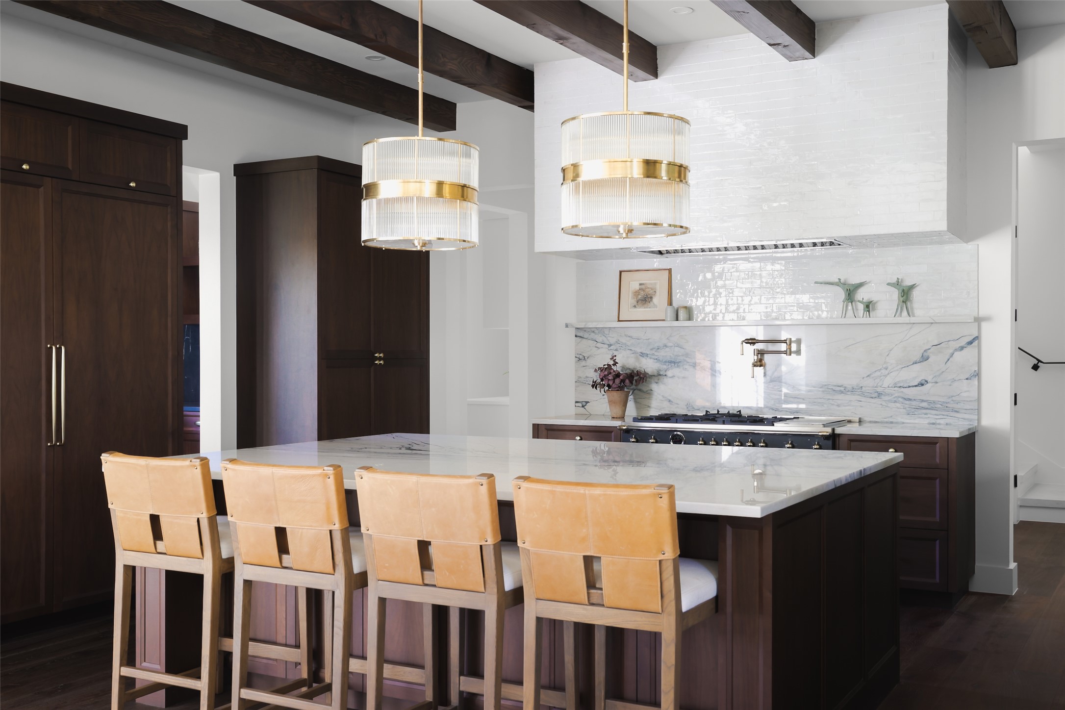 125 Broadwing Cove Austin, TX 78737 - Photo 12 of 40 a kitchen with stainless steel appliances granite countertop a sink and a refrigerator