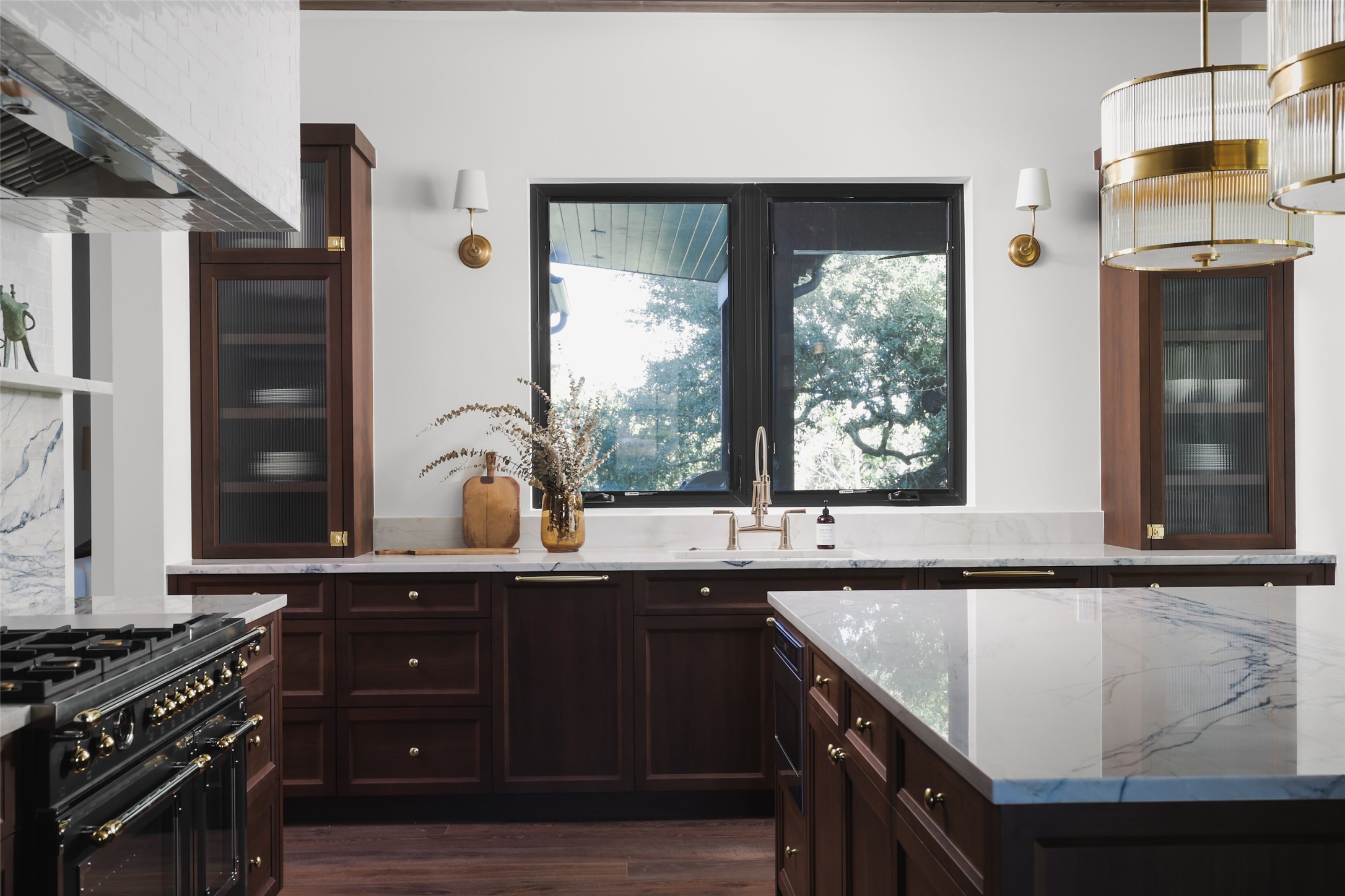 125 Broadwing Cove Austin, TX 78737 - Photo 39 of 40 a kitchen with granite countertop a stove and a sink