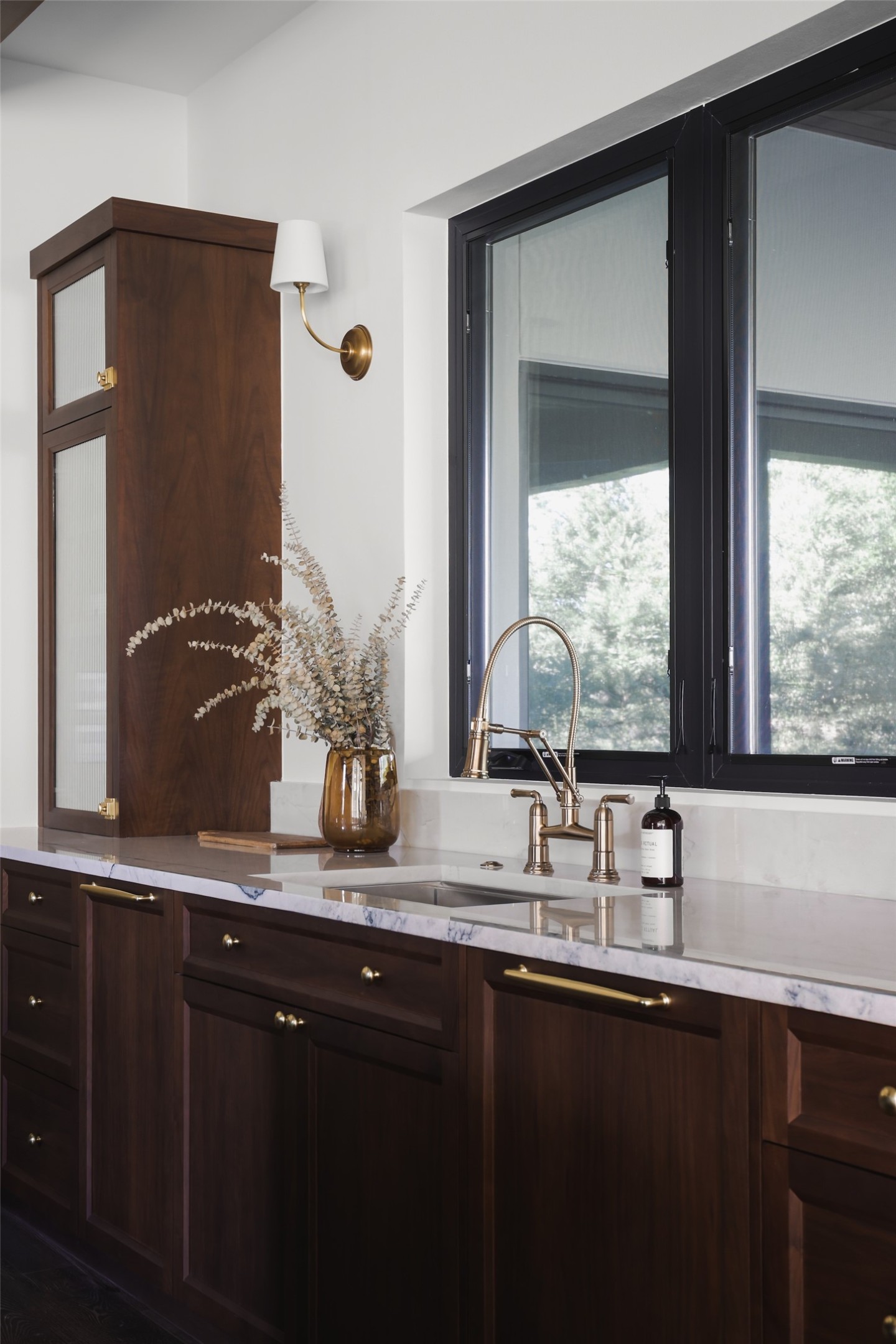 125 Broadwing Cove Austin, TX 78737 - Photo 14 of 40 a bathroom with a double vanity sink and a window