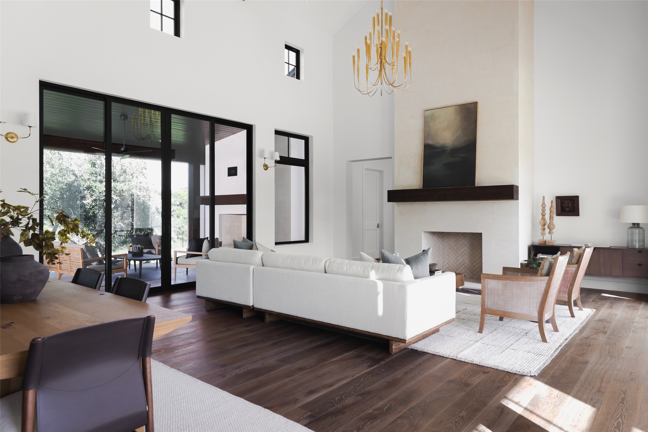 125 Broadwing Cove Austin, TX 78737 - Photo 38 of 40 a living room with fireplace furniture and a flat screen tv