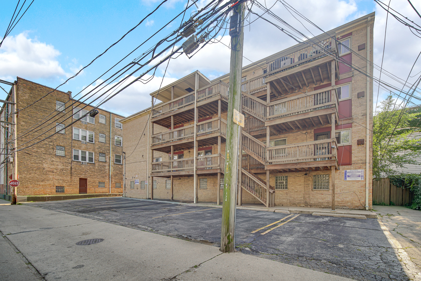 7019 North Ridge Boulevard, Unit 3B Chicago, IL 60645 - Photo 8 of 21 a view of a house with a street