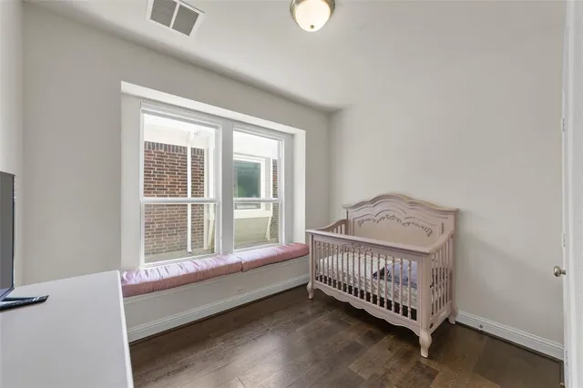 a view of a bedroom with window