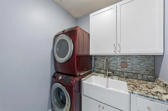 a bathroom with a sink a mirror and bathtub