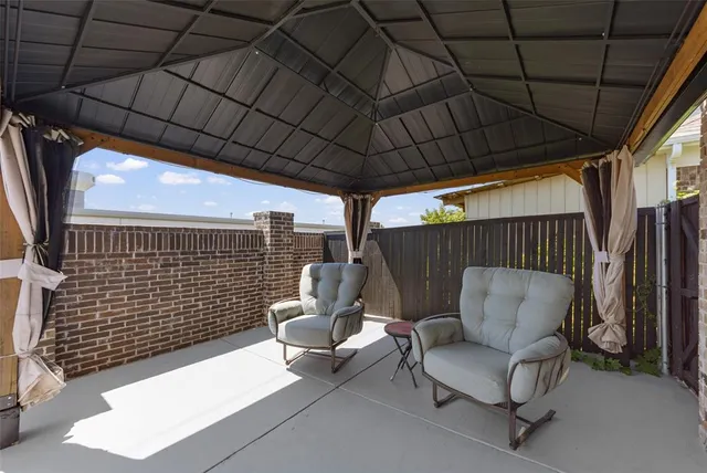 a building outdoor space with patio furniture