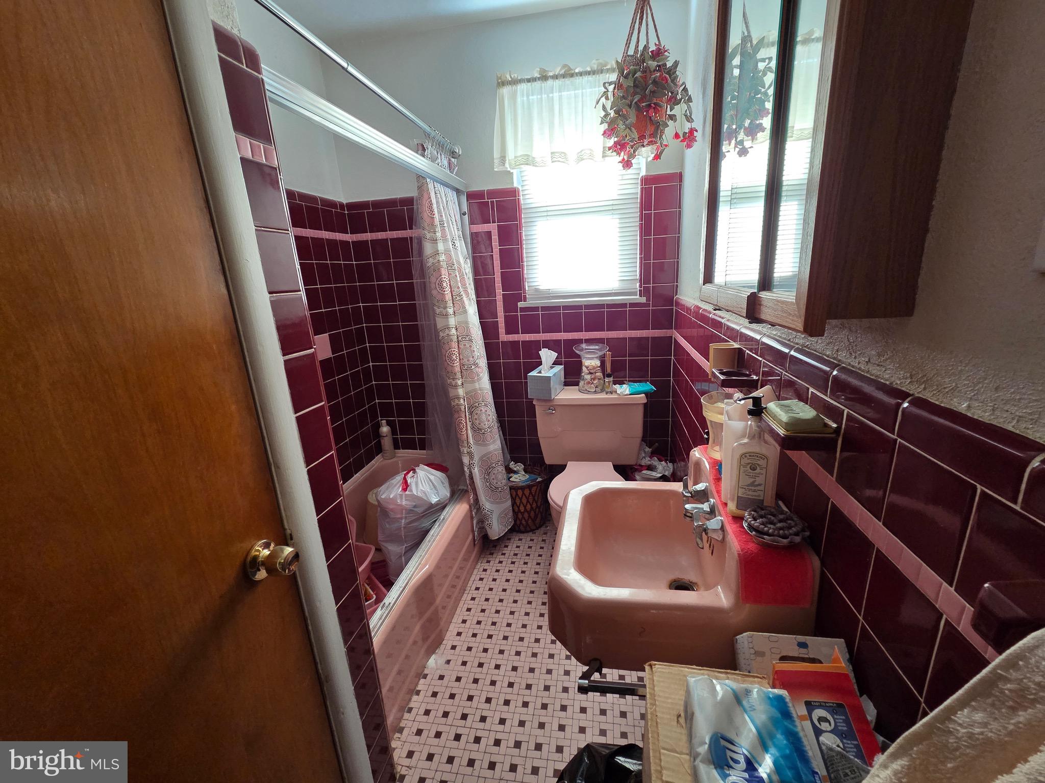 12 Collins Lane Maple Shade, NJ 08052 - Photo 17 of 20 a bathroom with a sink a toilet and mirror