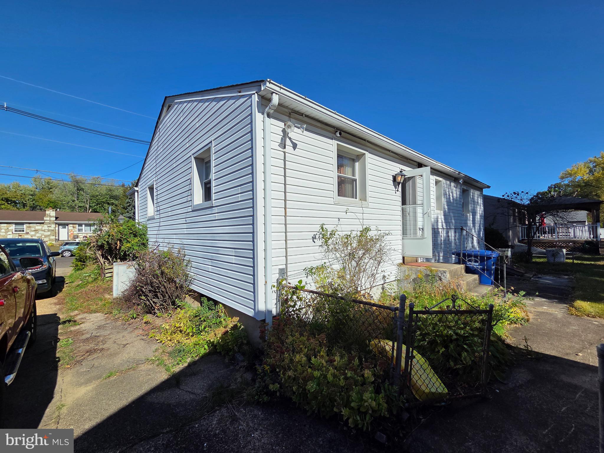 12 Collins Lane Maple Shade, NJ 08052 - Photo 5 of 20 a front view of a house with a yard