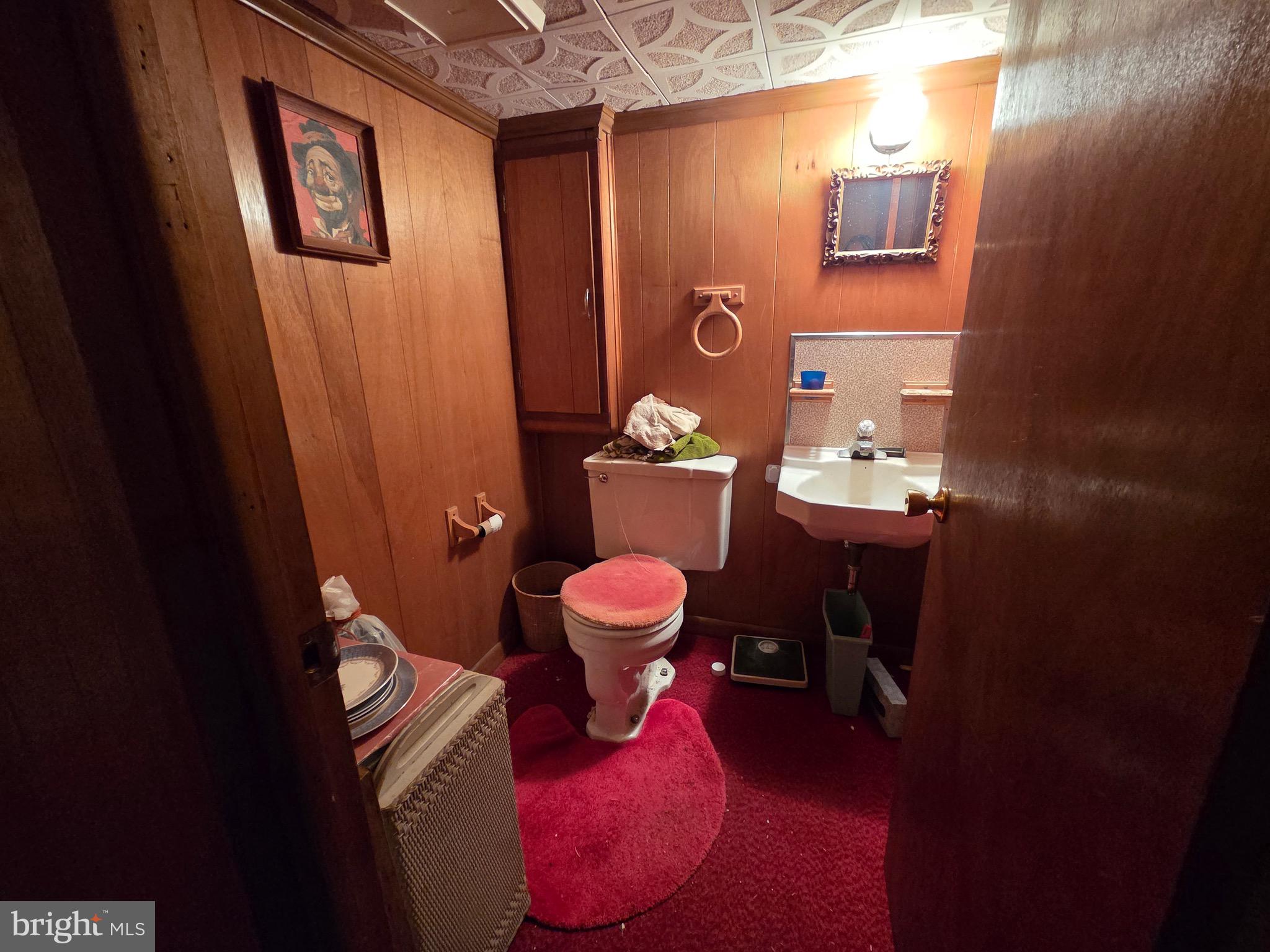12 Collins Lane Maple Shade, NJ 08052 - Photo 10 of 20 a bathroom with a sink mirror and toilet