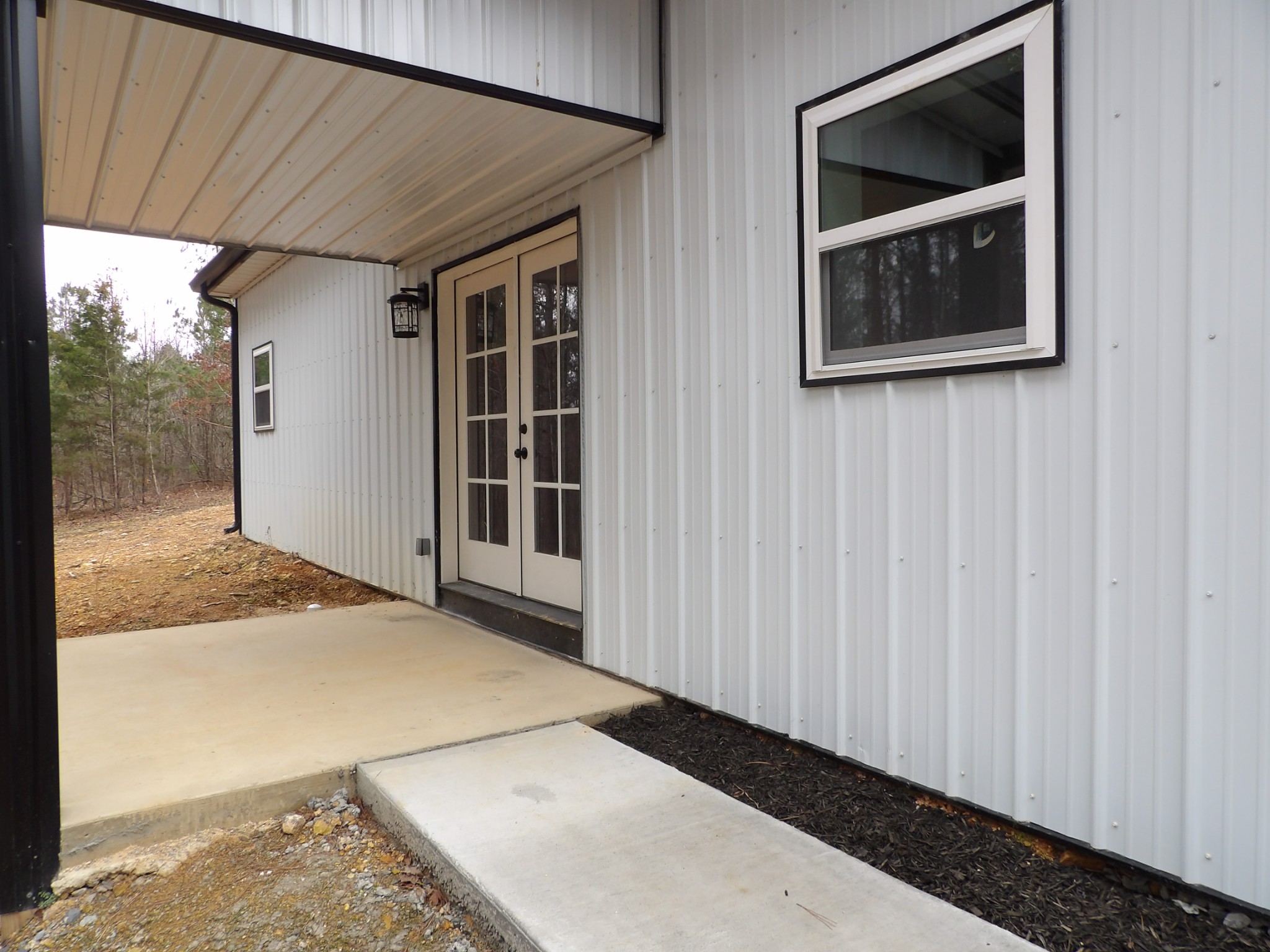 221 Howard Switch Road Hohenwald, TN 38462 - Photo 20 of 20 a view of a house entryway