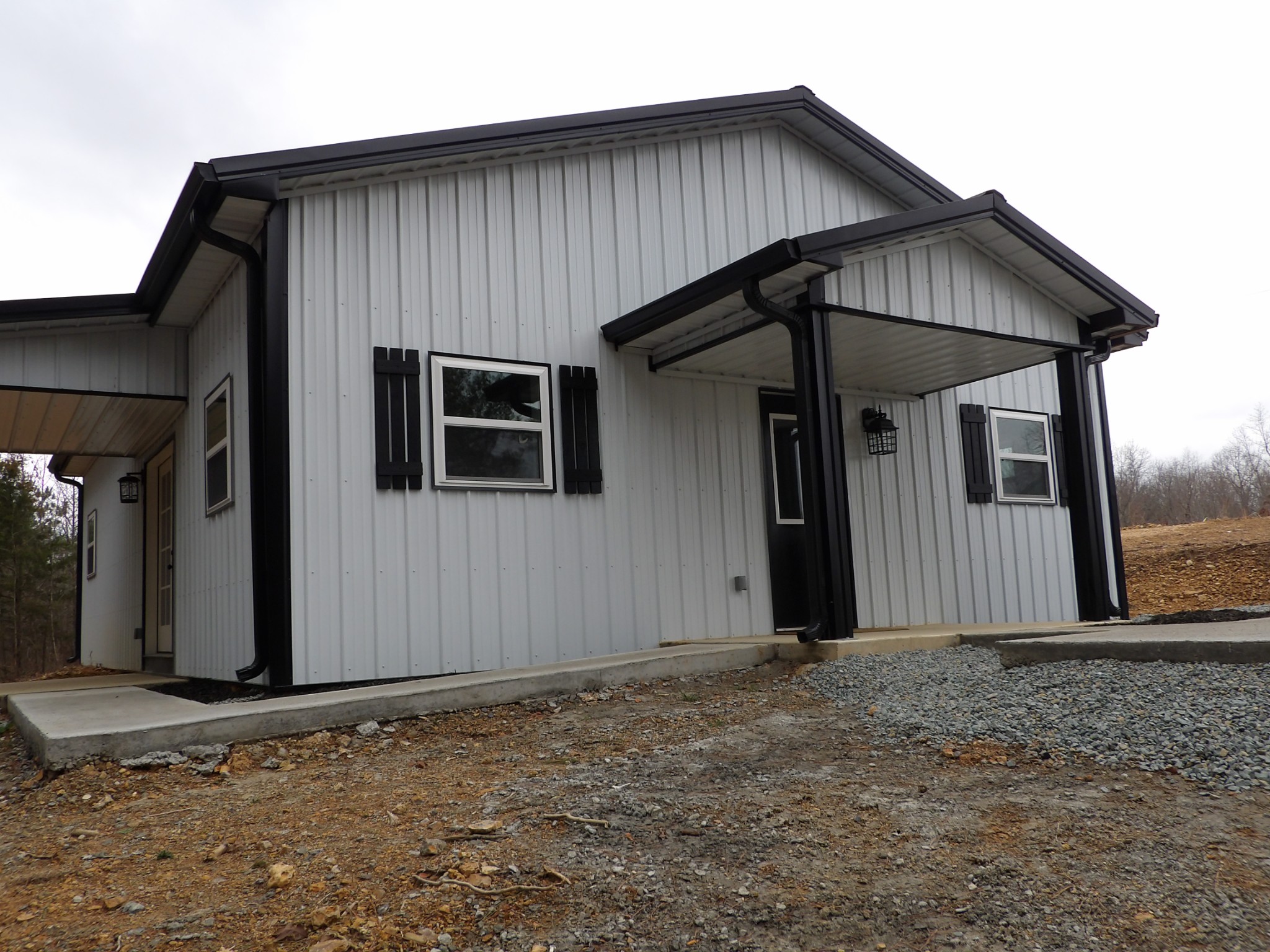 221 Howard Switch Road Hohenwald, TN 38462 - Photo 3 of 20 a backyard of a house