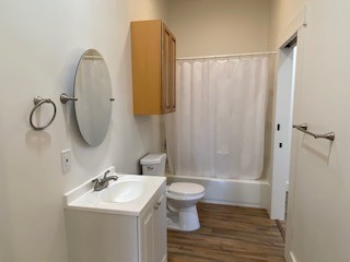 221 Howard Switch Road Hohenwald, TN 38462 - Photo 9 of 20 a bathroom with a sink toilet and shower
