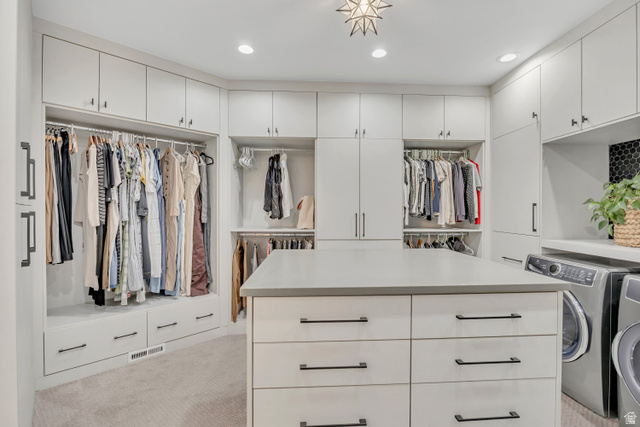1720 Hillcrest Circle Mapleton, UT 84664 - Photo 60 of 116 Walk in closet with washer and clothes dryer and light carpet