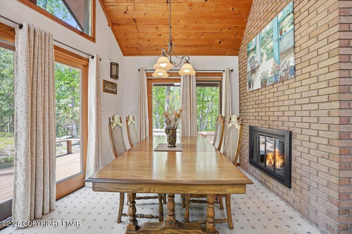 1517 Deer Run East Bushkill, PA 18324 - Photo 15 of 42 a view of a dining room with furniture window and wooden floor