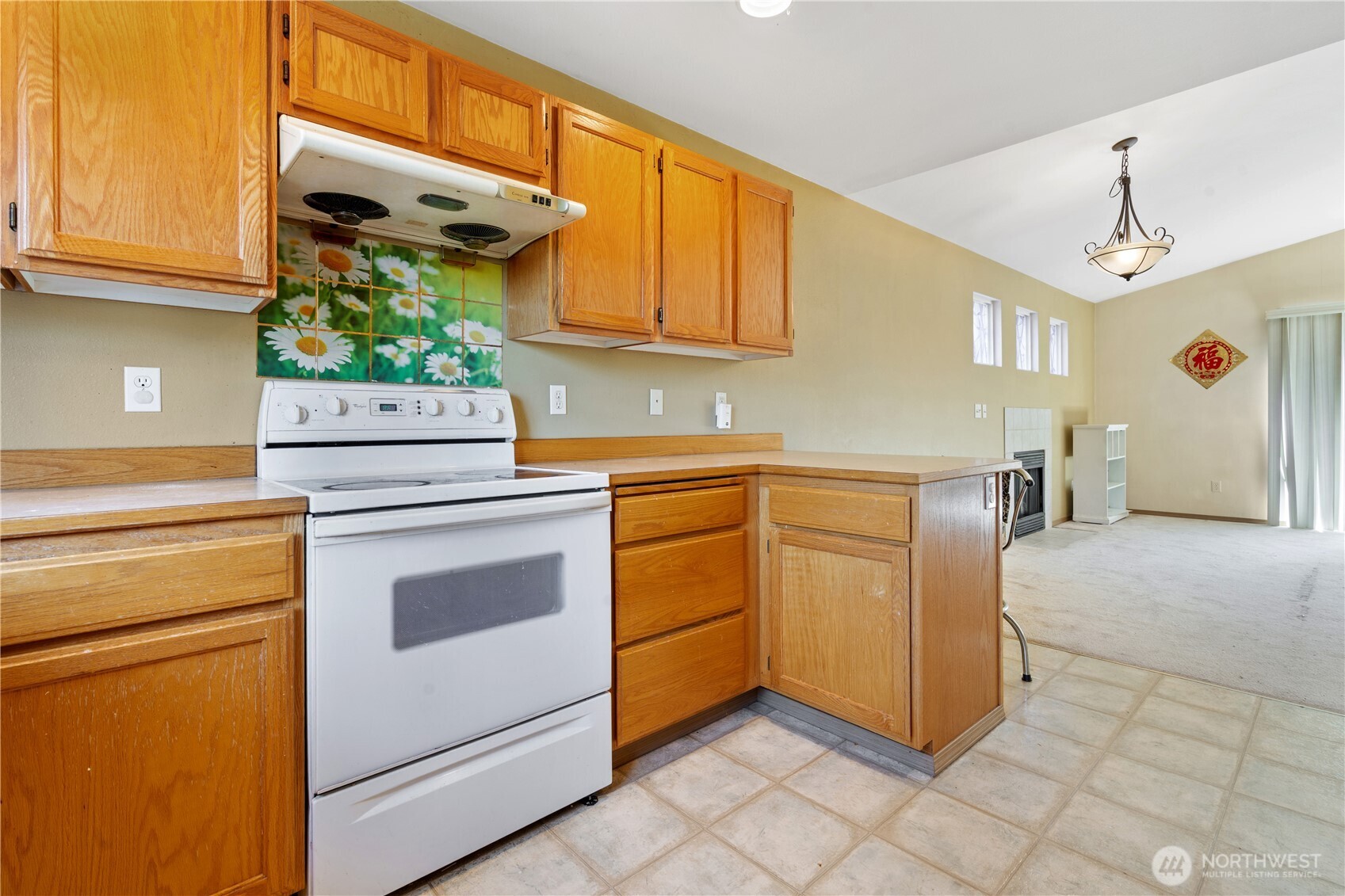 5620 Seahurst Avenue Everett, WA 98203 - Photo 5 of 28 a kitchen with stainless steel appliances white cabinets and white appliances