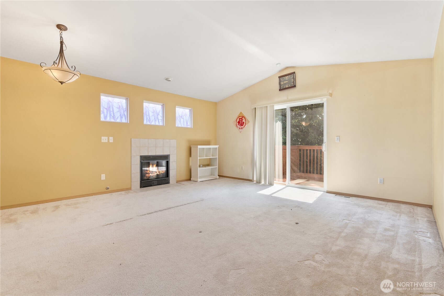 5620 Seahurst Avenue Everett, WA 98203 - Photo 7 of 28 a view of an empty room with a fireplace