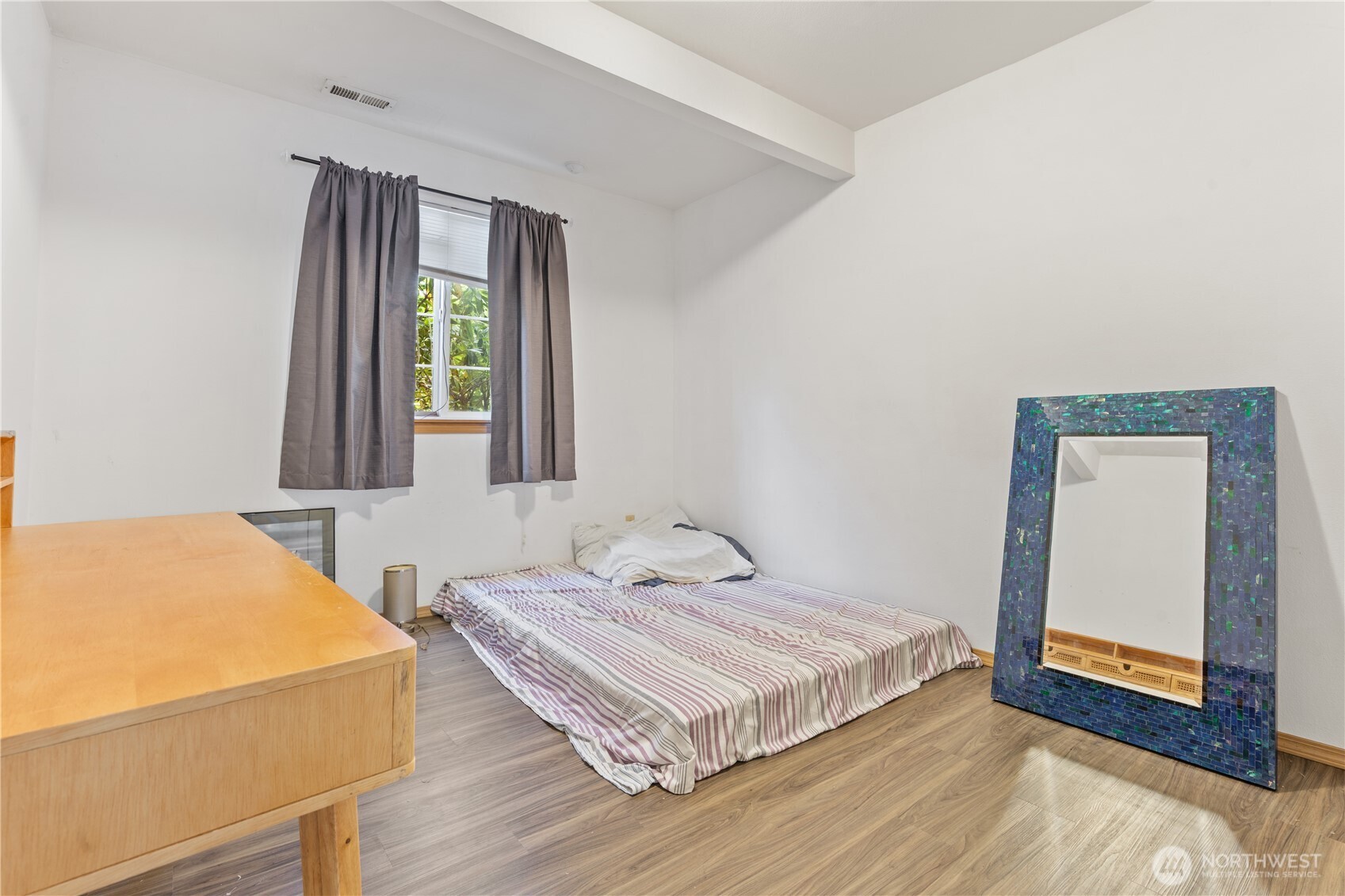 5620 Seahurst Avenue Everett, WA 98203 - Photo 10 of 28 a bedroom with a bed and a dresser