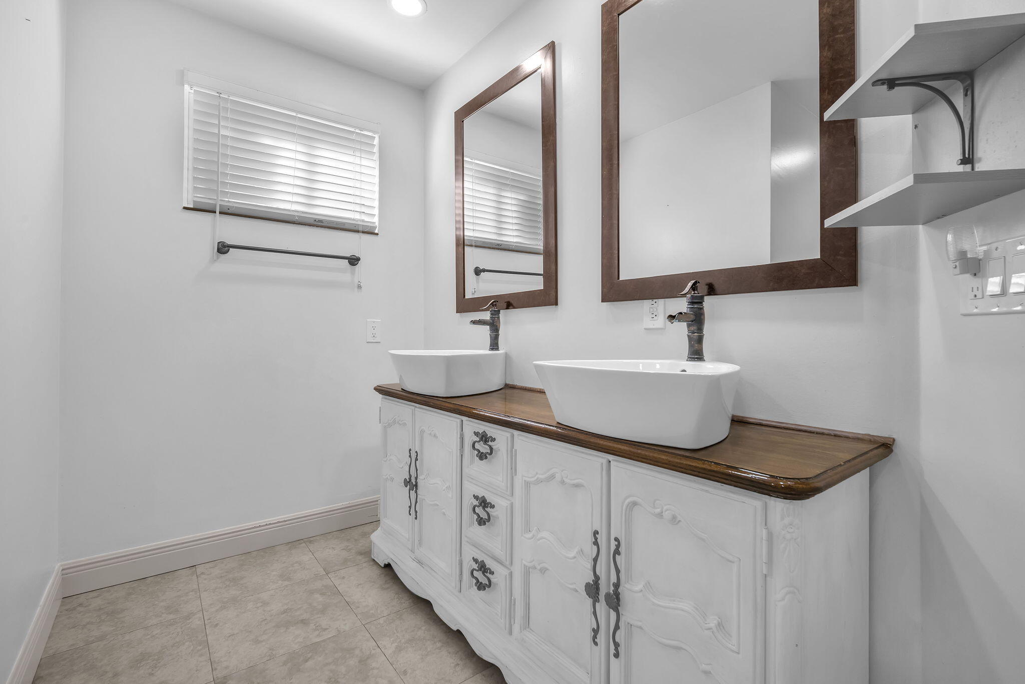 15225 Southwest 235th Street Homestead, FL 33032 - Photo 20 of 96 a kitchen with sink cabinets and window