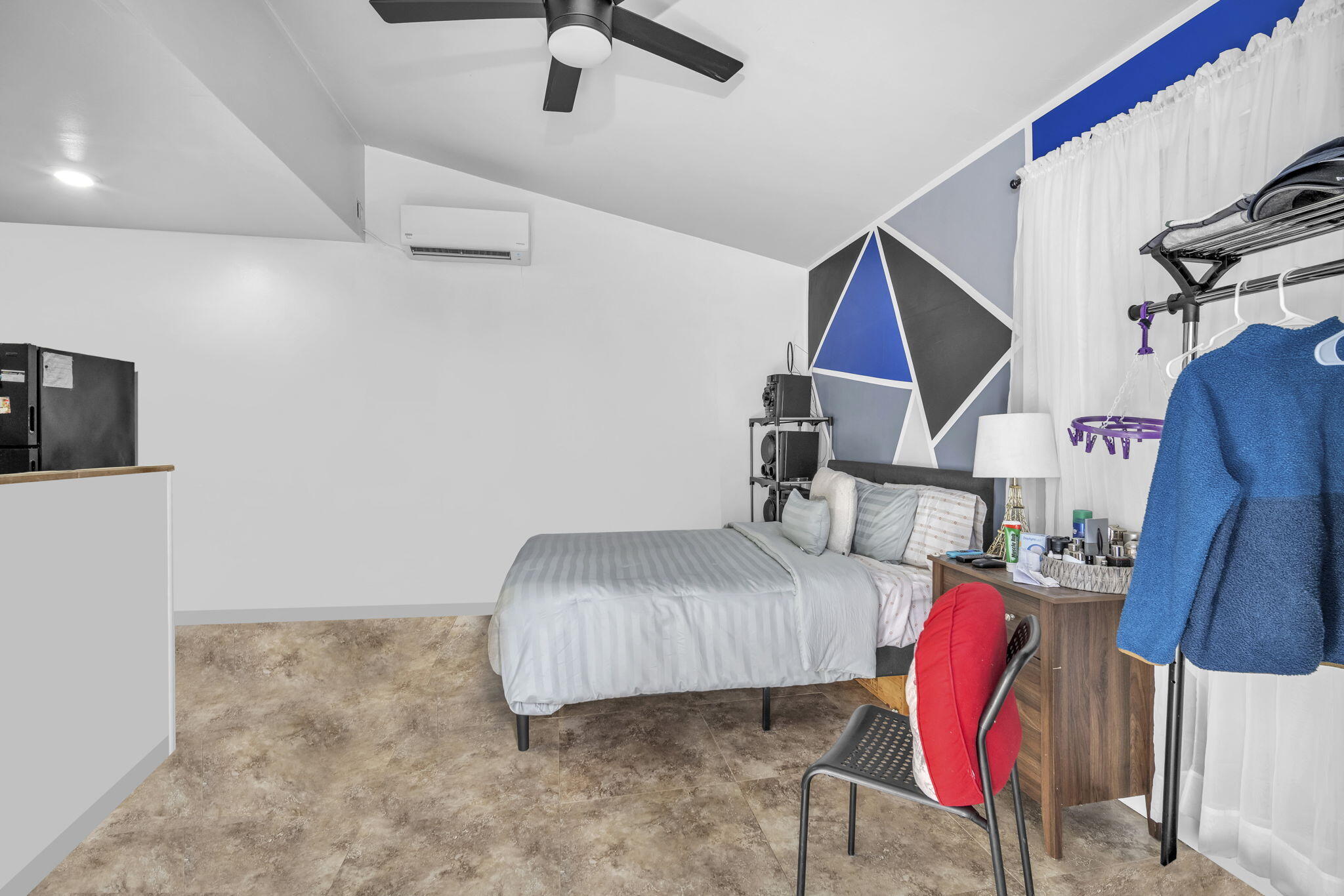 15225 Southwest 235th Street Homestead, FL 33032 - Photo 37 of 96 a bedroom with furniture and a ceiling fan