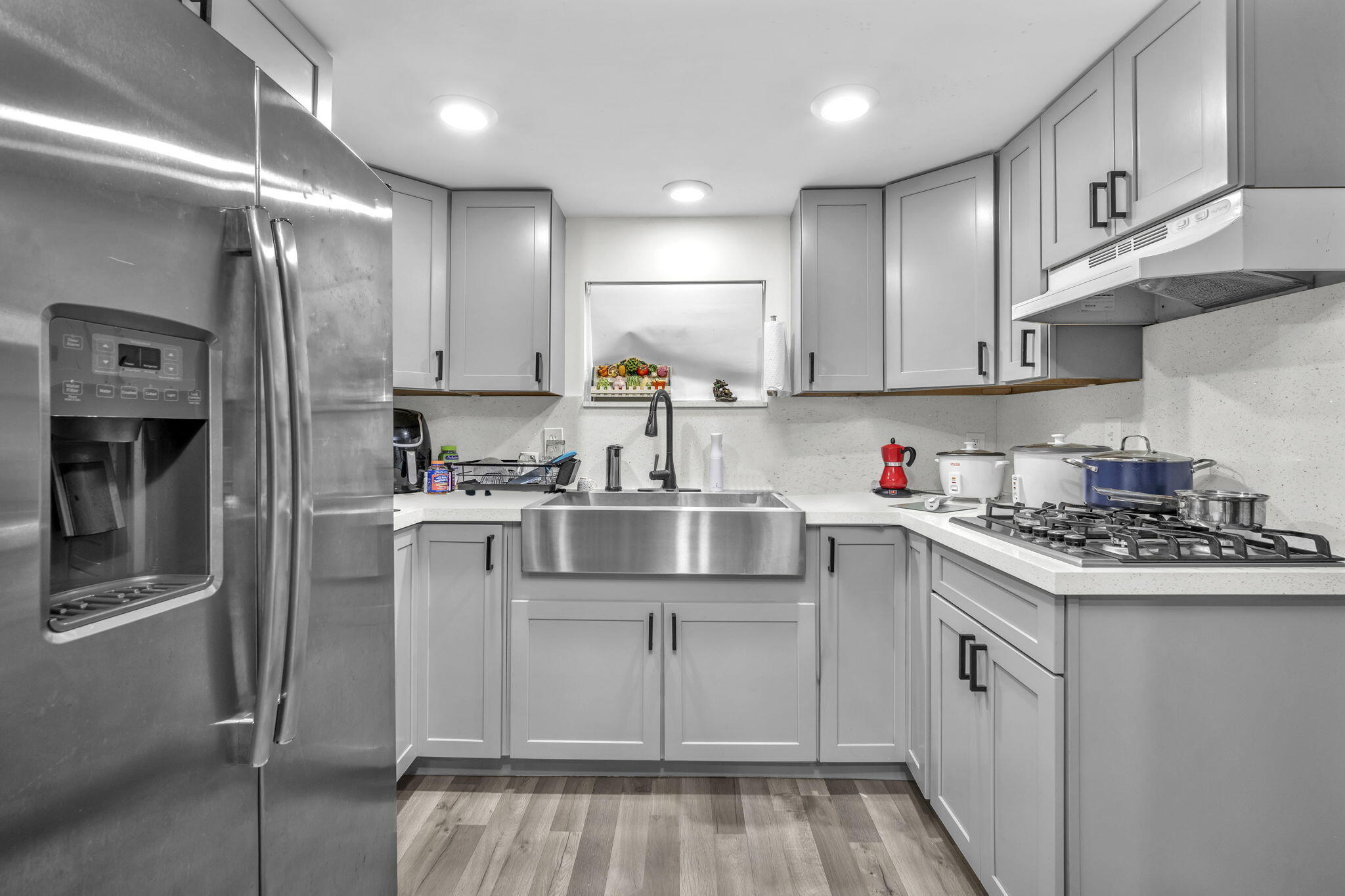 15225 Southwest 235th Street Homestead, FL 33032 - Photo 50 of 96 a kitchen with cabinets and stainless steel appliances