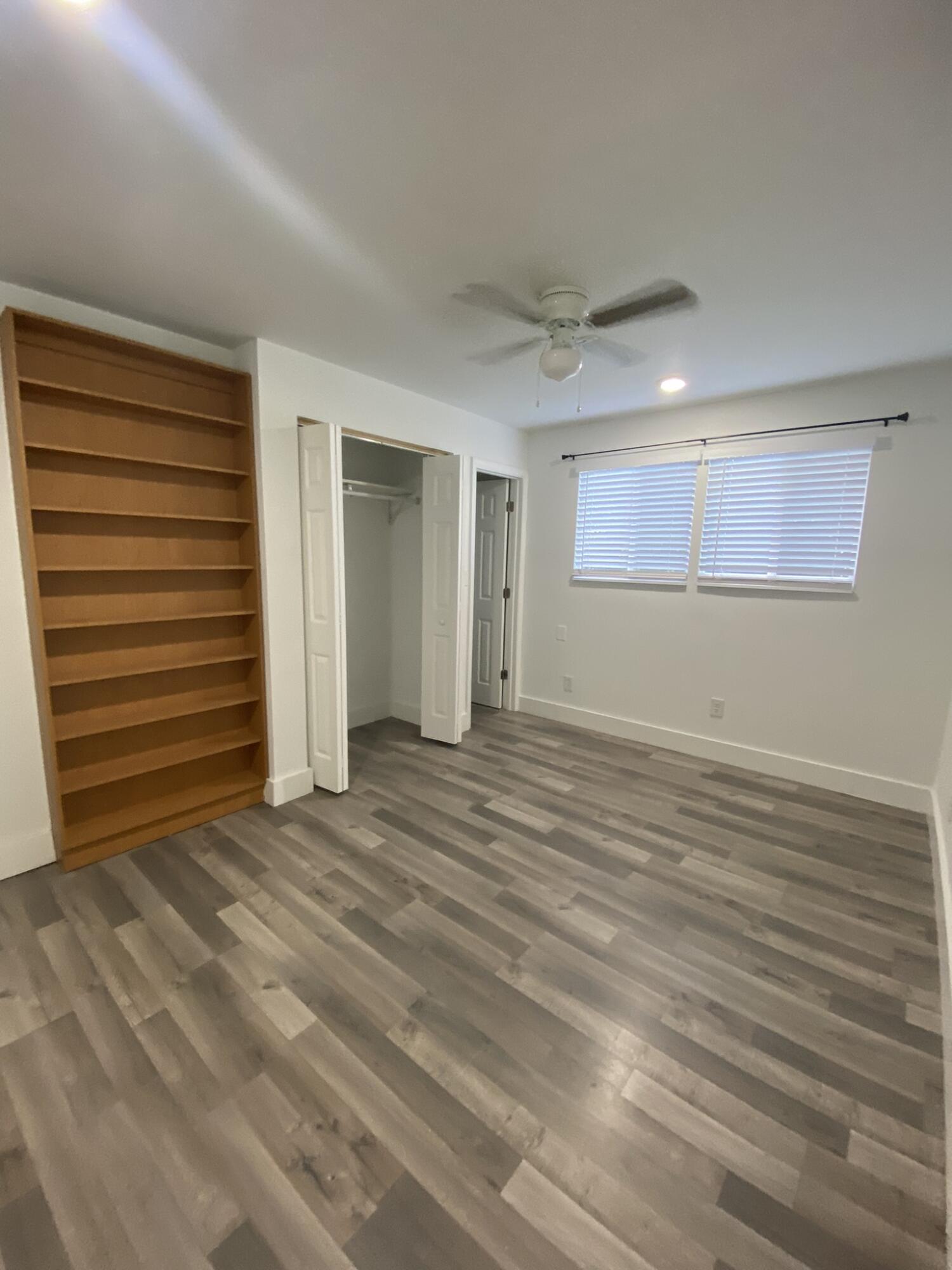 15225 Southwest 235th Street Homestead, FL 33032 - Photo 55 of 96 a view of empty room with wooden floor