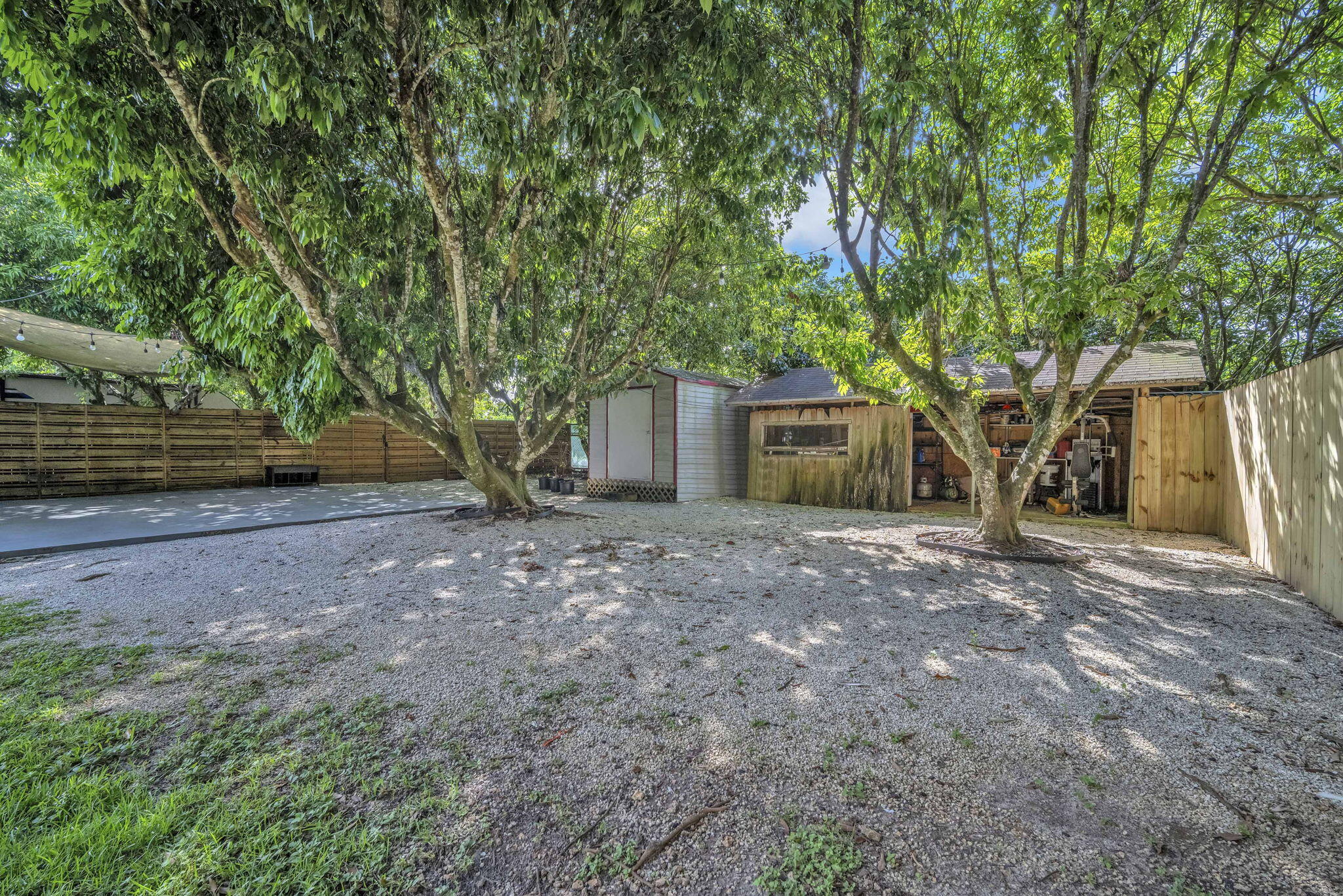 15225 Southwest 235th Street Homestead, FL 33032 - Photo 68 of 96 a view of a house with a tree