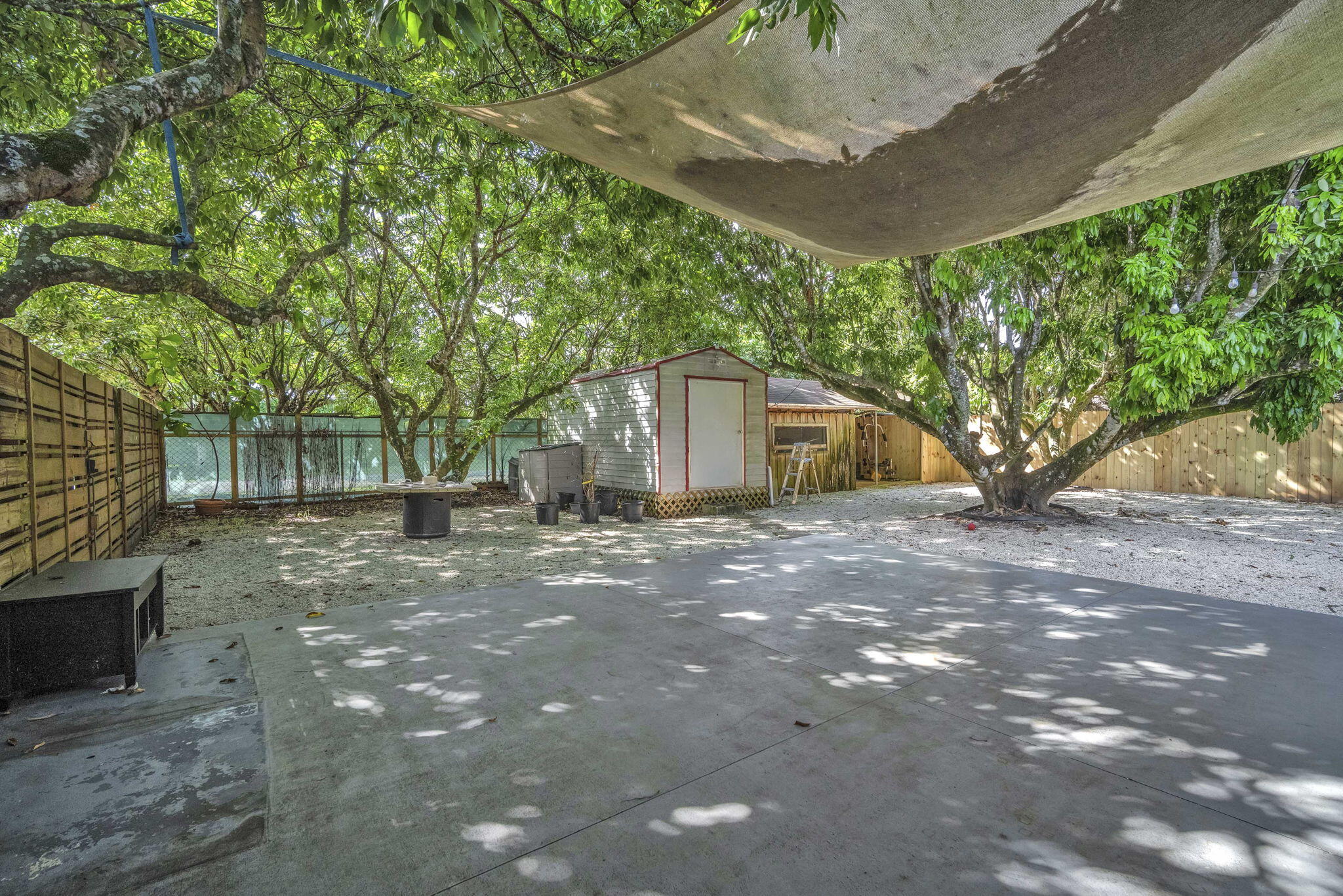 15225 Southwest 235th Street Homestead, FL 33032 - Photo 70 of 96 a view of a house with a tree