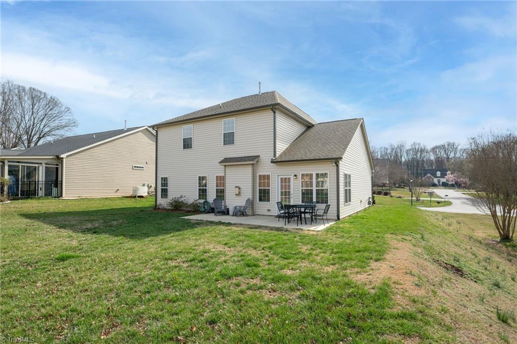 6291 Armsburg Road Clemmons, NC 27012 - Photo 44 of 50 Back yard with 10' x 24" concrete patio