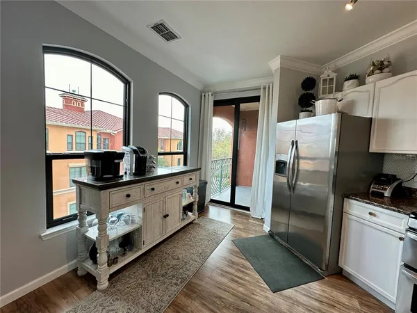 a view of balcony with furniture