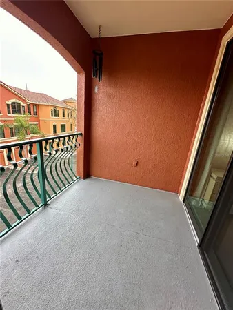 a view of an buildings from the balcony