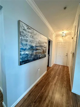 a bedroom with a bed and a ceiling fan