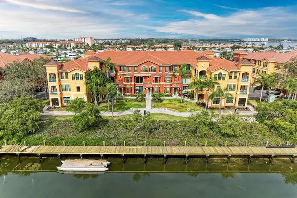 a view of multiple houses with a lake view