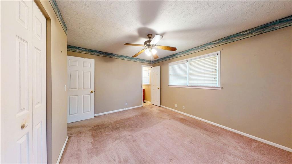 40 Lois Road Southwest Euharlee, GA 30120 - Photo 19 of 37 a view of an empty room with a window