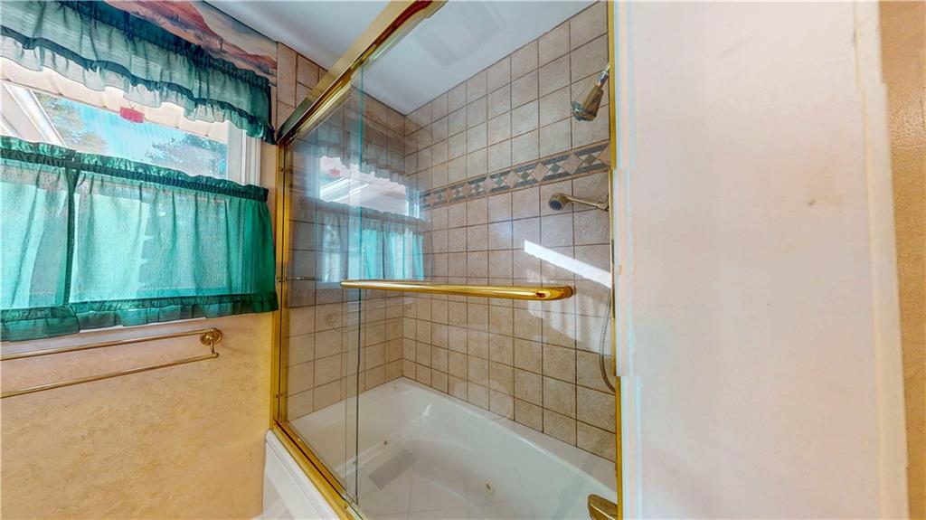 40 Lois Road Southwest Euharlee, GA 30120 - Photo 20 of 37 a bathroom with a shower