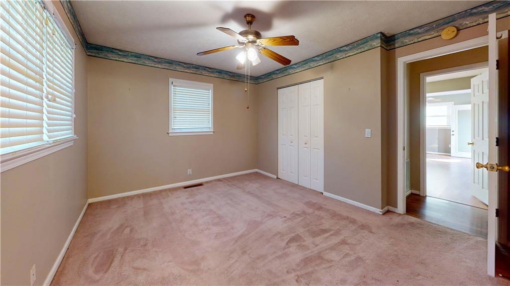 40 Lois Road Southwest Euharlee, GA 30120 - Photo 27 of 37 a view of an empty room with a window