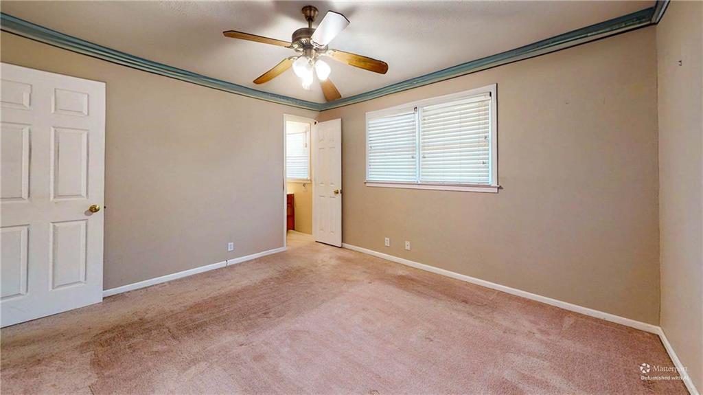 40 Lois Road Southwest Euharlee, GA 30120 - Photo 29 of 37 an empty room with fan and windows