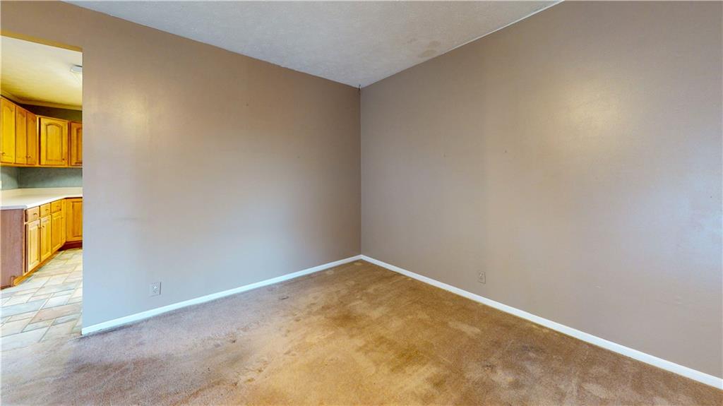 40 Lois Road Southwest Euharlee, GA 30120 - Photo 8 of 37 an empty room with a window