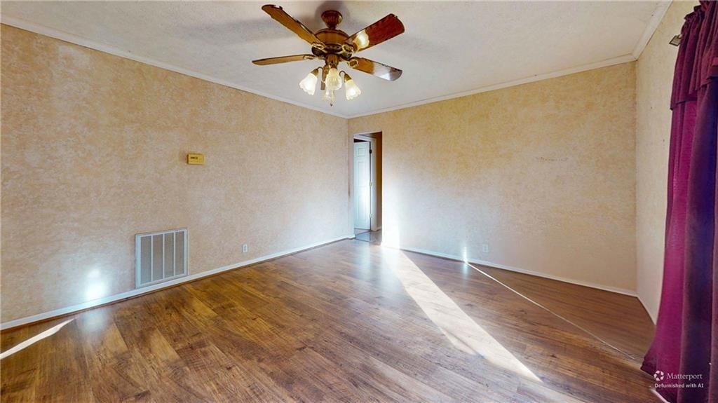 40 Lois Road Southwest Euharlee, GA 30120 - Photo 9 of 37 a view of empty room with wooden floor