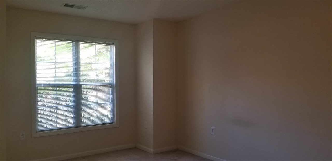 11211 Avocet Lane, Unit 103 Raleigh, NC 27617 - Photo 2 of 18 Master Bedroom