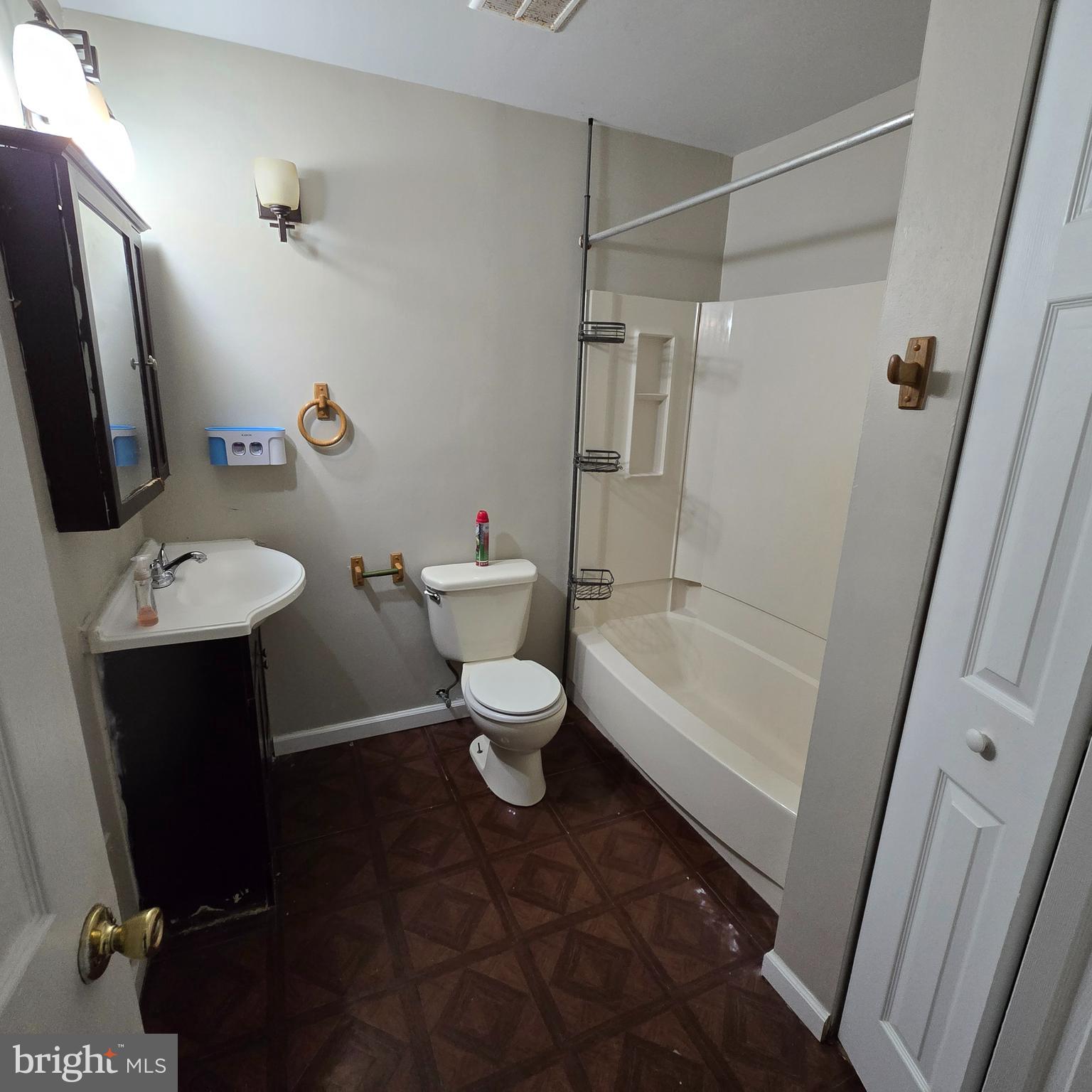 206 Hollybush Place Clementon, NJ 08021 - Photo 17 of 17 a bathroom with a sink toilet and shower