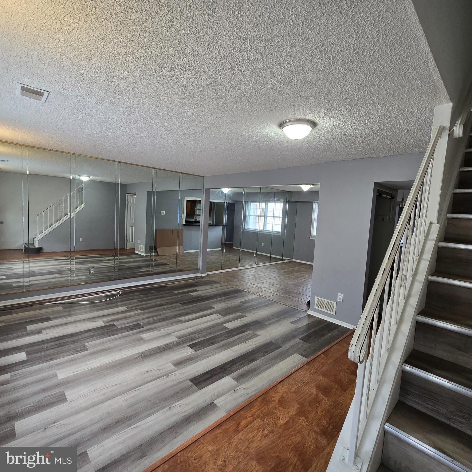 206 Hollybush Place Clementon, NJ 08021 - Photo 2 of 17 a view of entryway and hall with wooden floor
