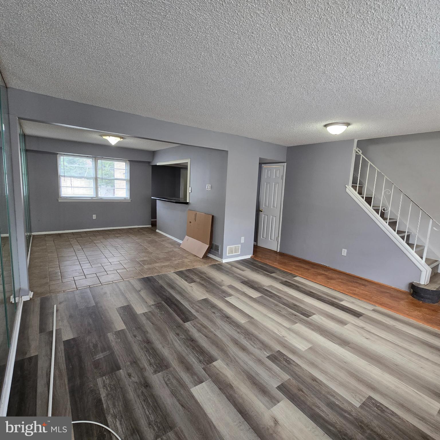 206 Hollybush Place Clementon, NJ 08021 - Photo 3 of 17 a view of empty room with wooden floor