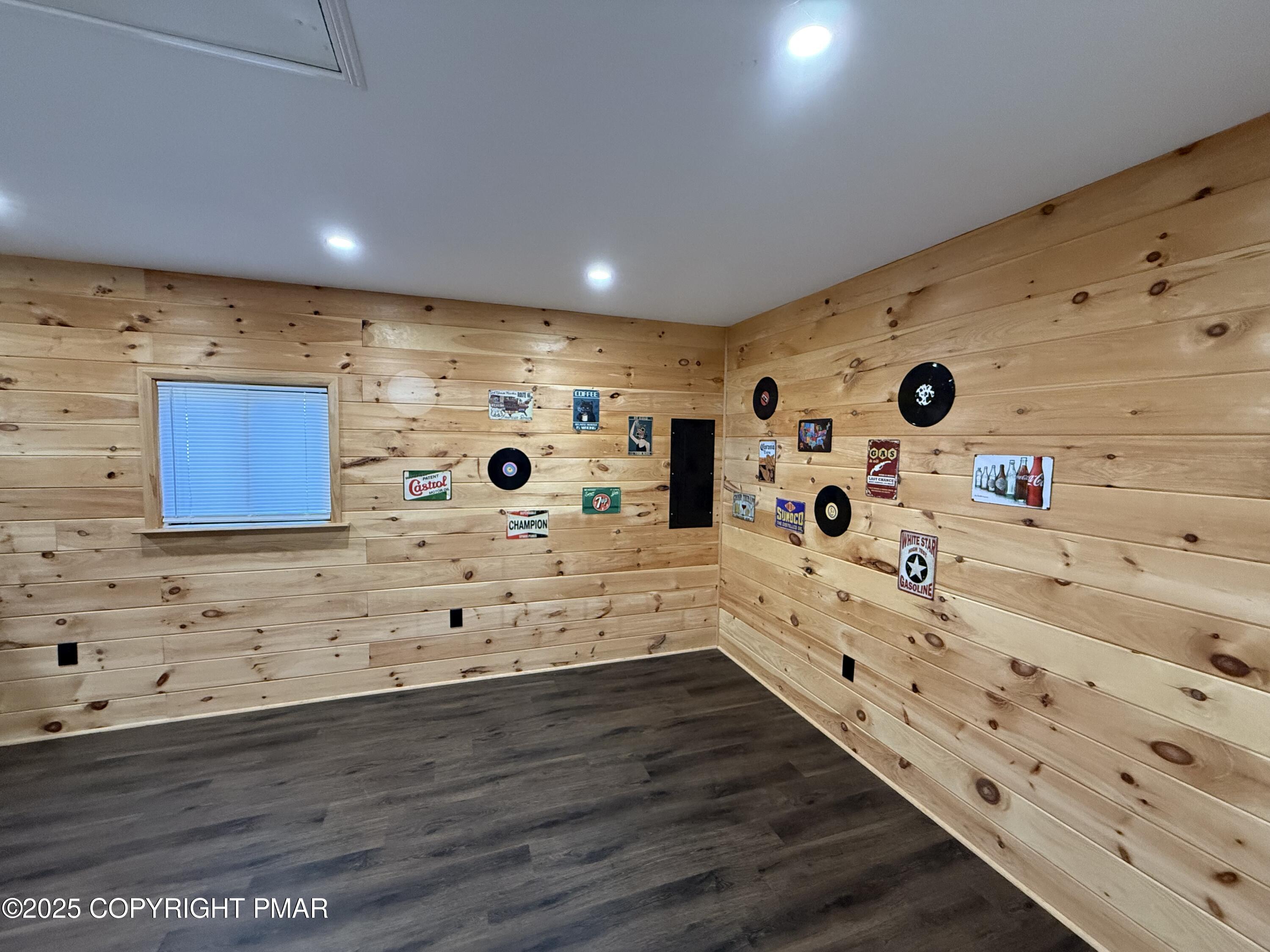 3195 Hamlet Drive Tobyhanna, PA 18466 - Photo 11 of 19 a kitchen with stainless steel appliances wooden cabinets and a wooden floor