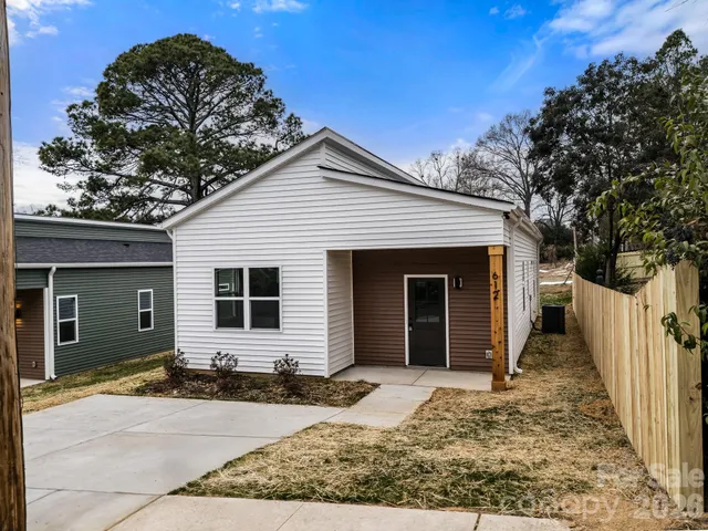 a house with trees in the background