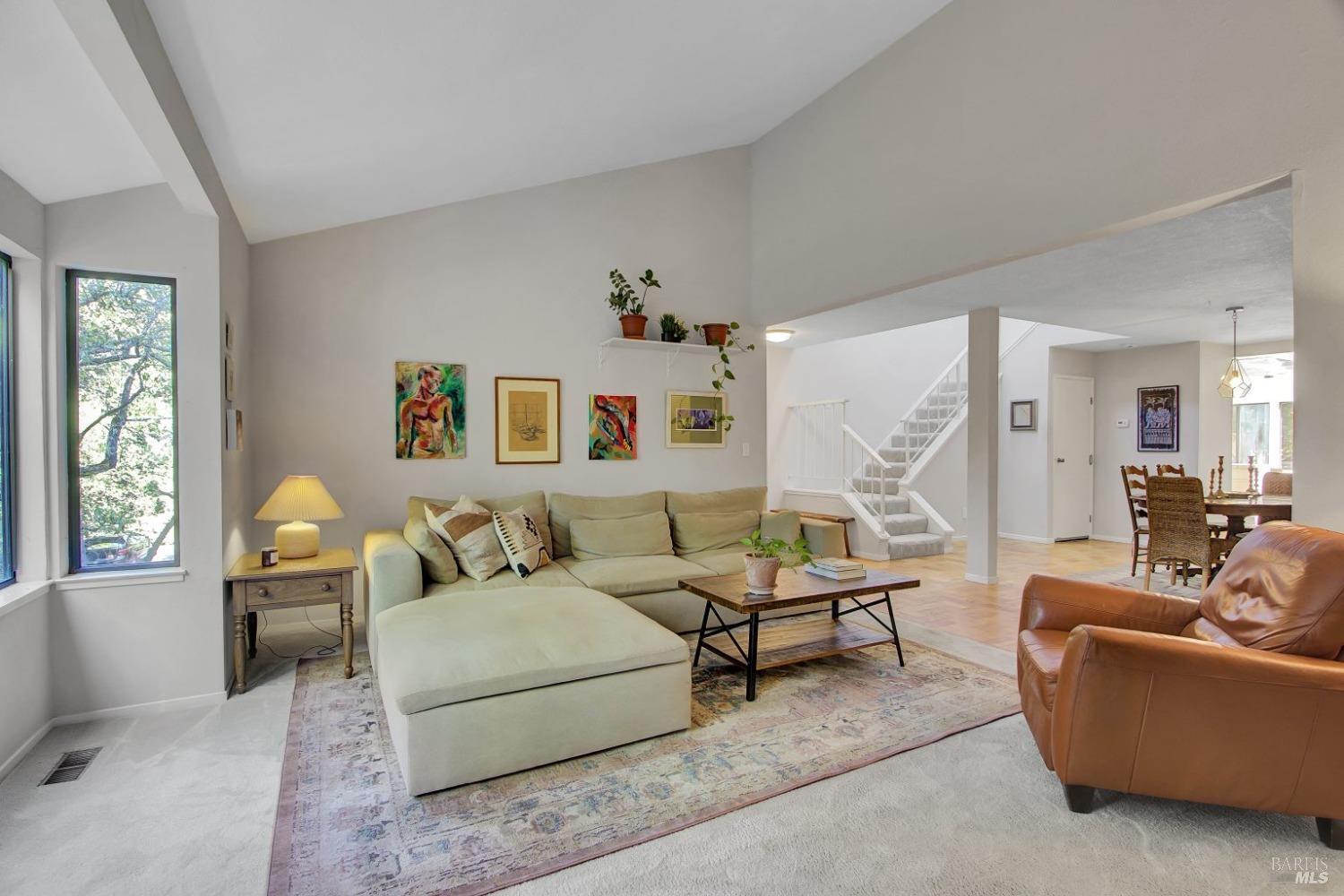 8 Elegant Tern Road Novato, CA 94949 - Photo 1 of 1 a living room with furniture and a large window