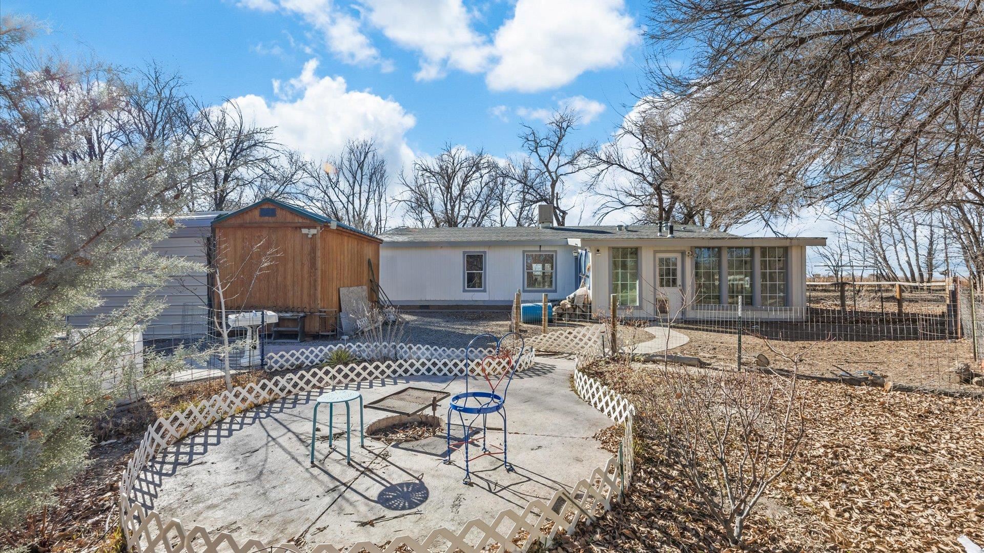 777 1550th Road Delta, CO 81416 - Photo 26 of 32 a house view with a sitting space and garden space