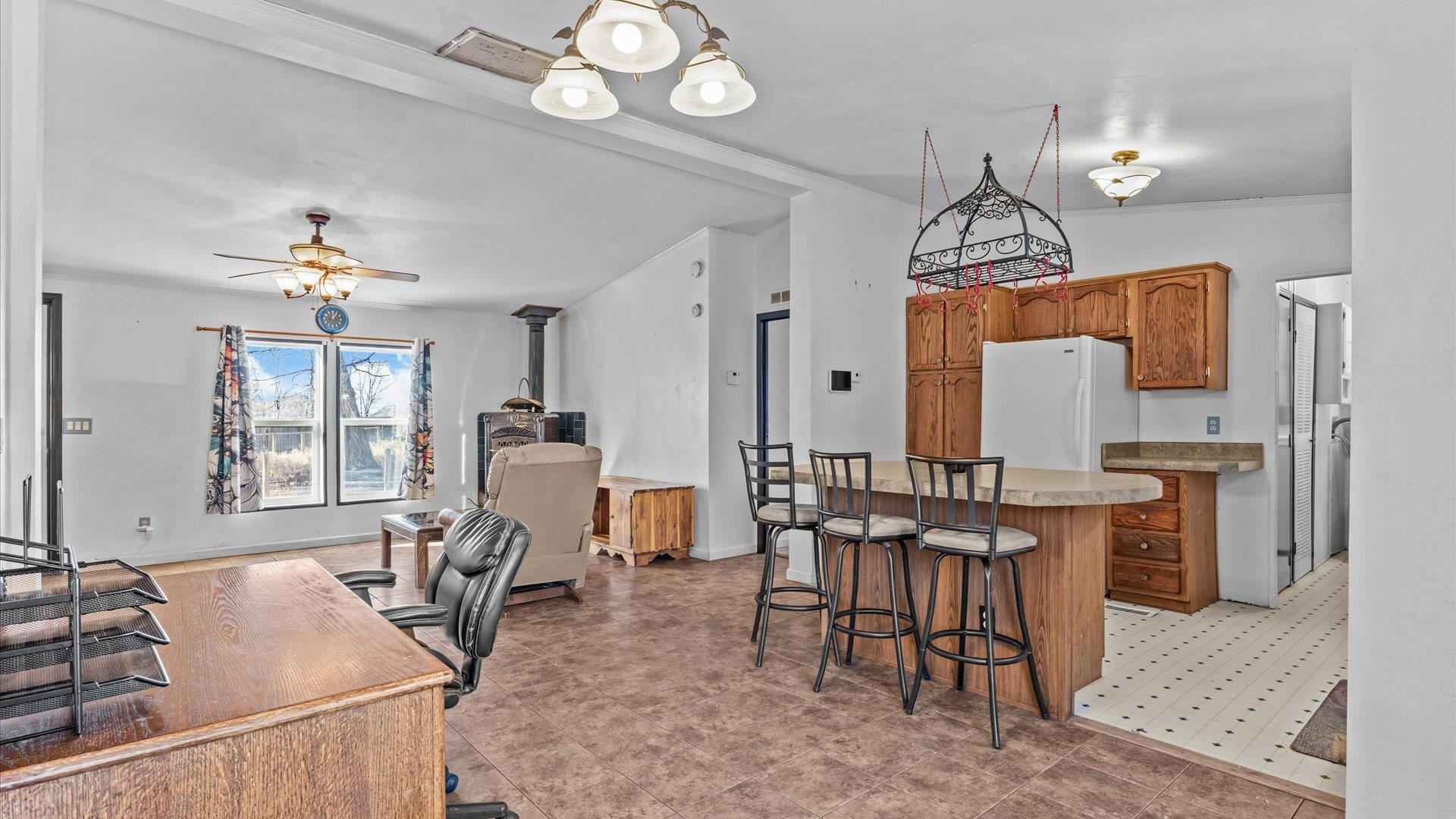 777 1550th Road Delta, CO 81416 - Photo 9 of 32 a view of a dining room with furniture