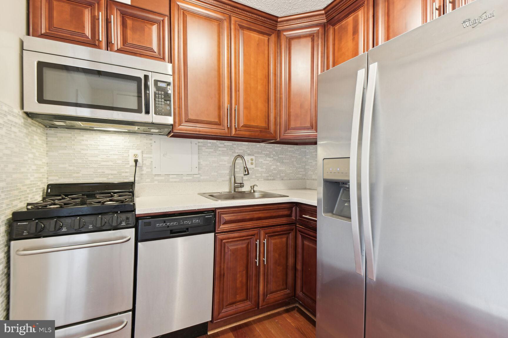 1250 4th Street Southwest, Unit W413 Washington, DC 20024 - Photo 4 of 36 Updated kitchen w/ quartz counters & SS appliances