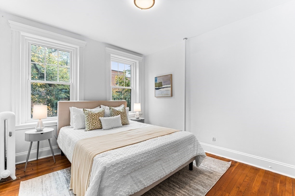 72 Strathmore Road, Unit 5B Boston, MA 02135 - Photo 14 of 18 a bedroom with a bed and a window