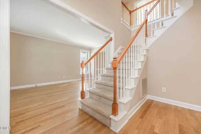 a view of entryway with wooden floor