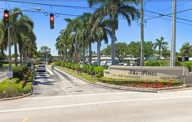 a view of a park with palm trees