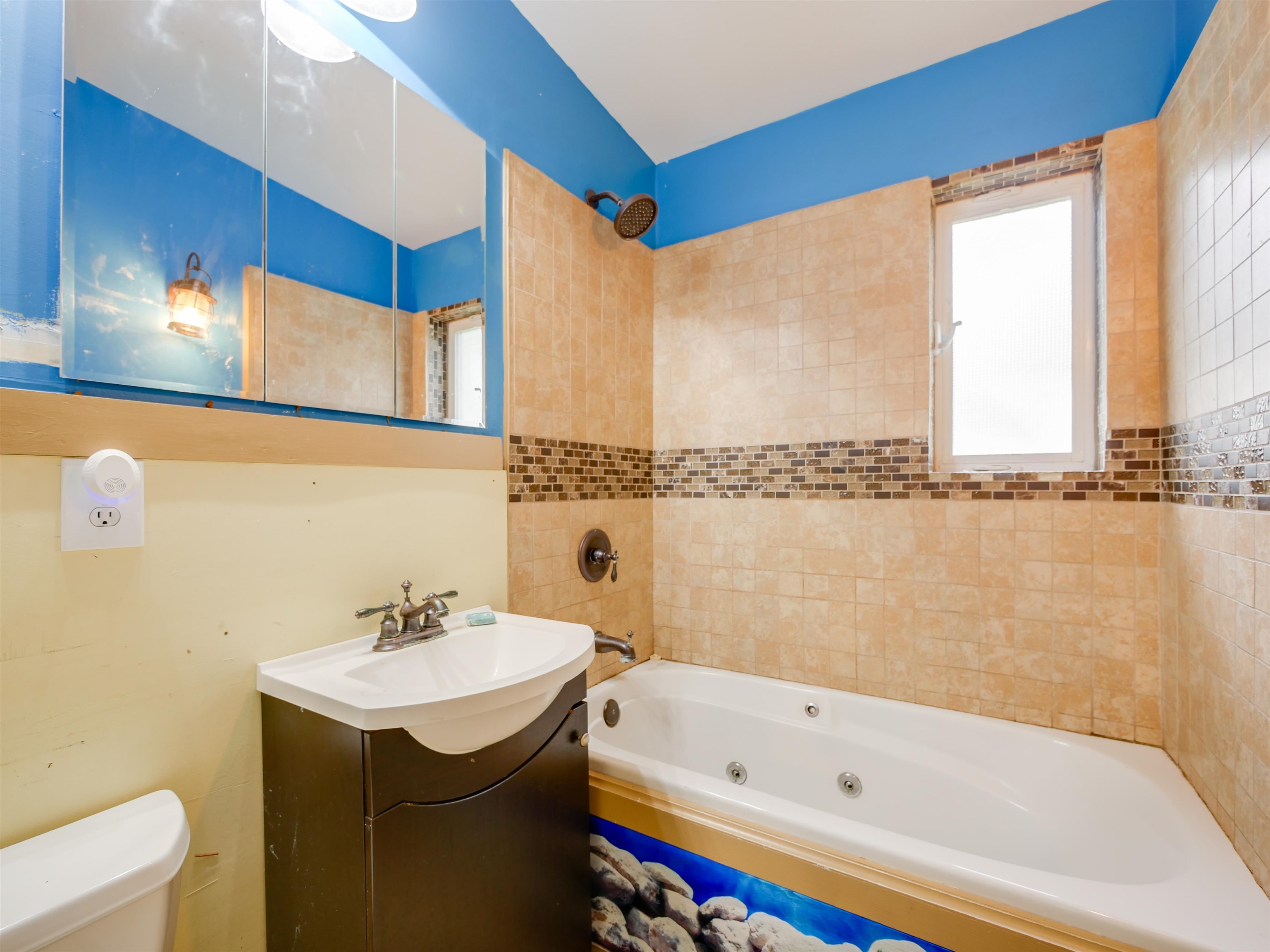 262 Spring Street St. Augustine, FL 32084 - Photo 12 of 25 a bathroom with a sink and a bathtub